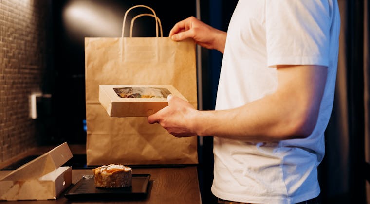 Food delivery handoff at a doorstep